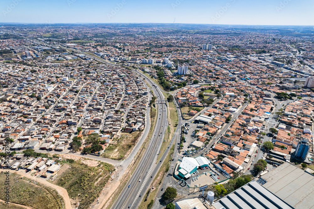 Aerial view of Parque Oziel neighborhood (also known as Jardim Monte Cristo) in Campinas, São Paulo. Poor community with wooden houses, garbage and vegetation in its surroundings. Aerial view of Parque Oziel neighborhood (also known as Jardim Monte Cristo) in Campinas, São Paulo. Poor community with wooden houses, garbage and vegetation in its surroundings.
