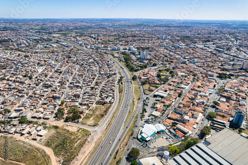 Aerial view of Parque Oziel neighborhood (also known as Jardim Monte Cristo) in Campinas, São Paulo. Poor community with wooden houses, garbage and vegetation in its surroundings.