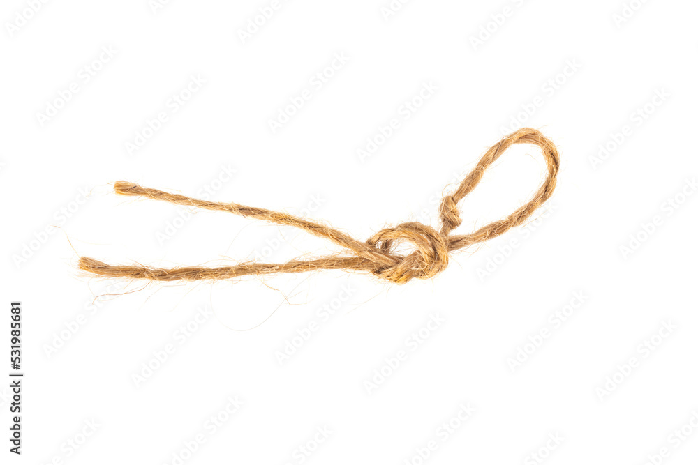 Piece of rope isolated on white background. Material for binding various products. Piece of rope isolated on white background. Material for binding various products.