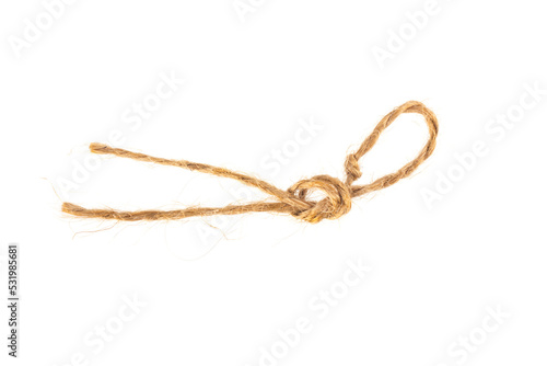 Piece of rope isolated on white background. Material for binding various products.
