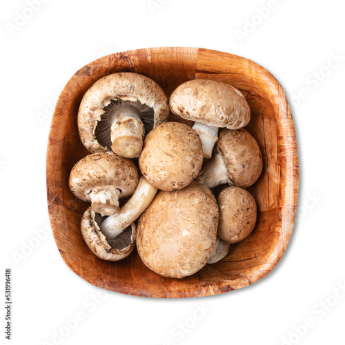 Portobello mushrooms in a bowl isolated over white background