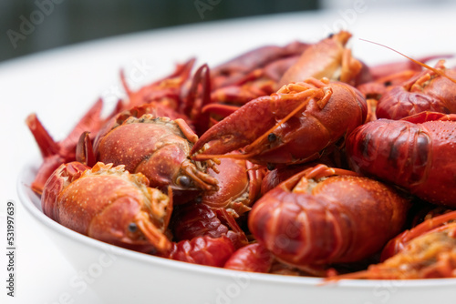 Close up delicious boiled crayfish food on a plate. Healthy and dieting meal