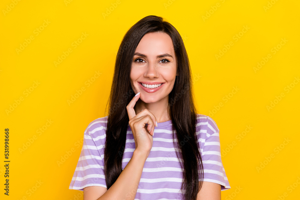 Closeup photo of young funny smiling attractive girl touch chin happy have rest isolated on yellow color background Closeup photo of young funny smiling attractive girl touch chin happy have rest isolated on yellow color background