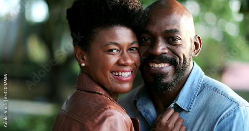 Black African couple smiling together. Man and woman portraits
