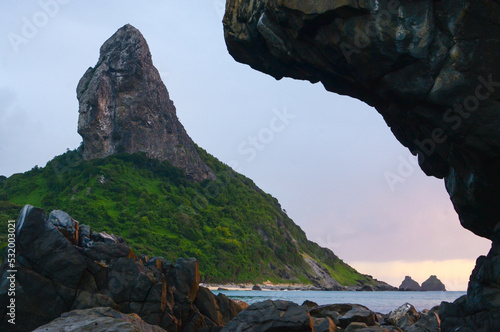 Beautiful view of Conceição Beach, Peak Hill and Two Brothers Rock, Fernando de Noronha archipelago, Brazil photo