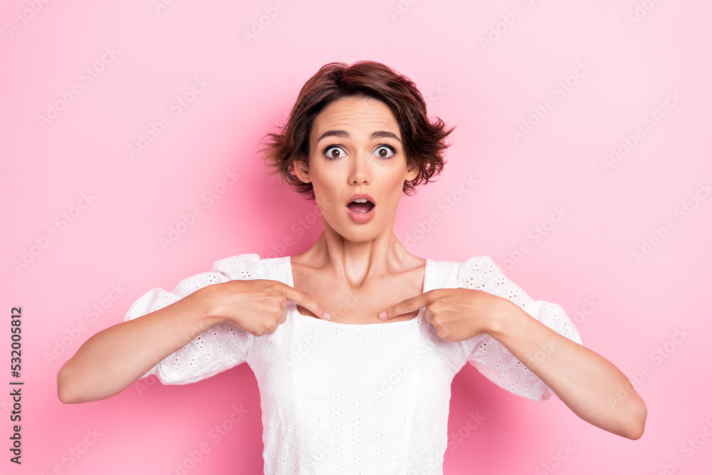 Photo of shocked impressed girl dressed white top open mouth pointing fingers herself isolated pink color background - obrazy, fototapety, plakaty 