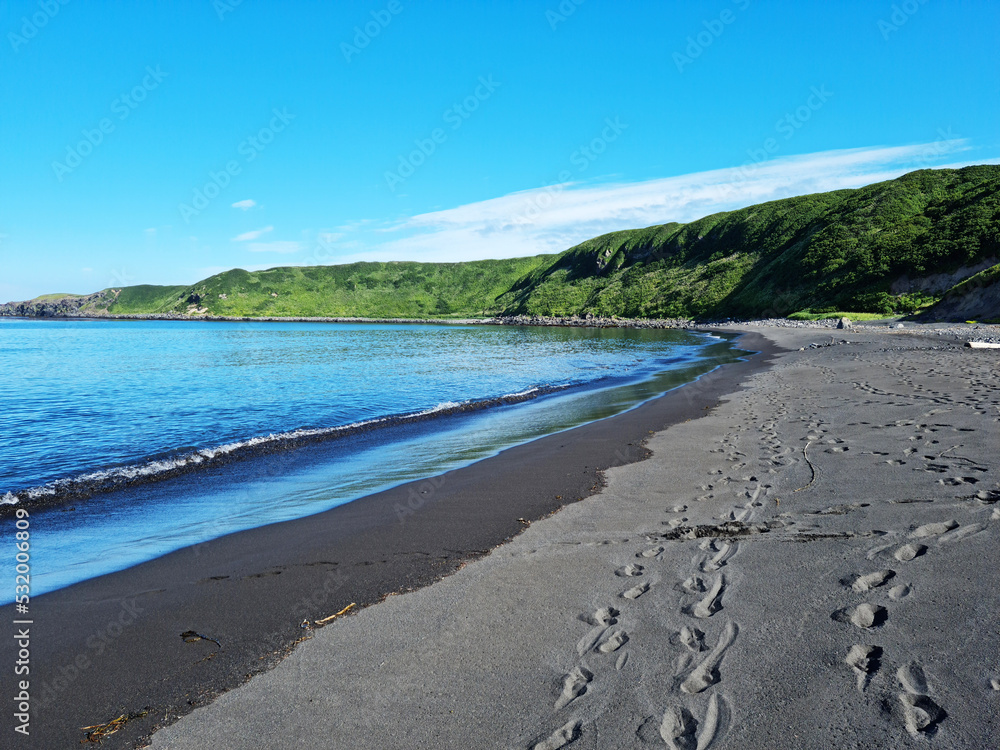 Obraz premium Russia, Kuril Islands, Sakhalin region. The nature of the Kamchatka Territory. Mountains and volcanoes surrounded by the Sea of Okhotsk and the ocean
