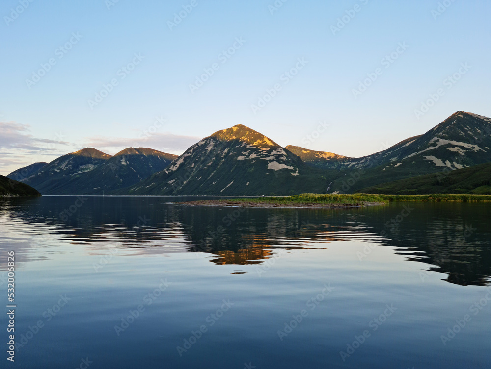 Russia, Kuril Islands, Sakhalin region. The nature of the Kamchatka Territory. Mountains and volcanoes surrounded by the Sea of Okhotsk and the ocean