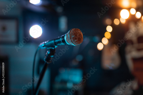 Close up of a classic microphone standing before a music show