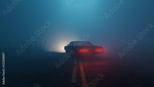 Car parked in middle of road in foggy moody forest during  blue hour photo