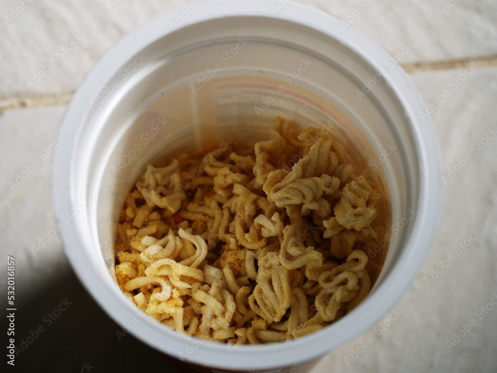 Instant noodles in a pot ready to eat close up Instant noodles in a pot ready to eat close up