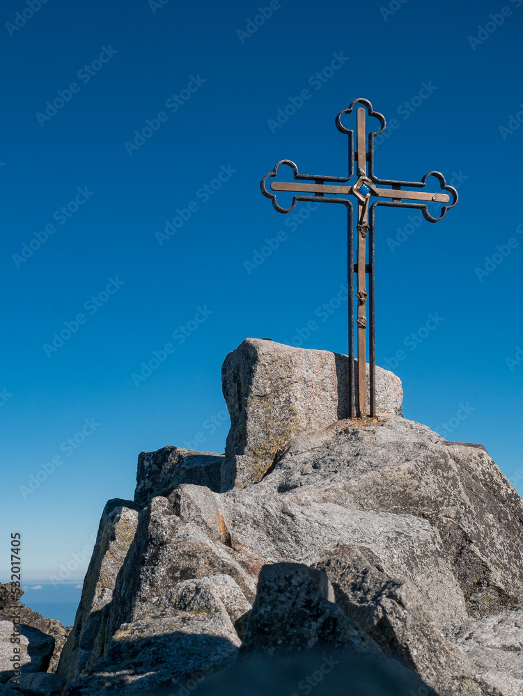 The peak of the highest mountain in Slovakia, Gerlachovsky Stit, on which a cross rises The peak of the highest mountain in Slovakia, Gerlachovsky Stit, on which a cross rises