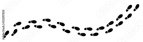 A trail of black footsteps (comics silhuoette shapes), going from the left to the right (horizontal orientation).
 photo