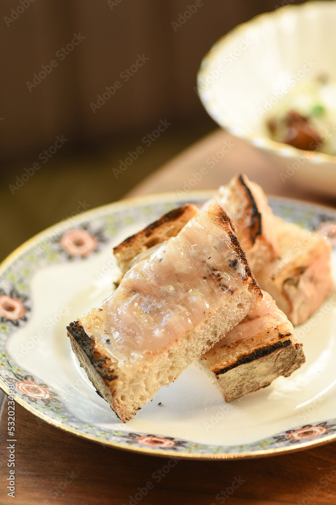 Bread wrapped in lard Bread wrapped in lard