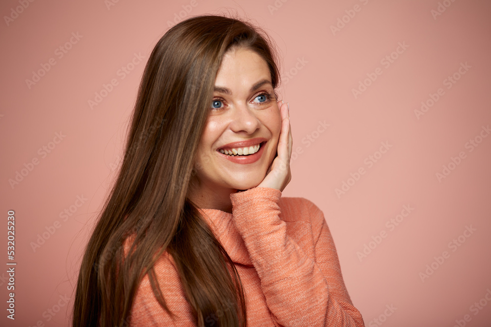 Close up female face with natural real skin. Isolated portrait on pink background. Girl touching her face and looking away. Close up female face with natural real skin. Isolated portrait on pink background. Girl touching her face and looking away.