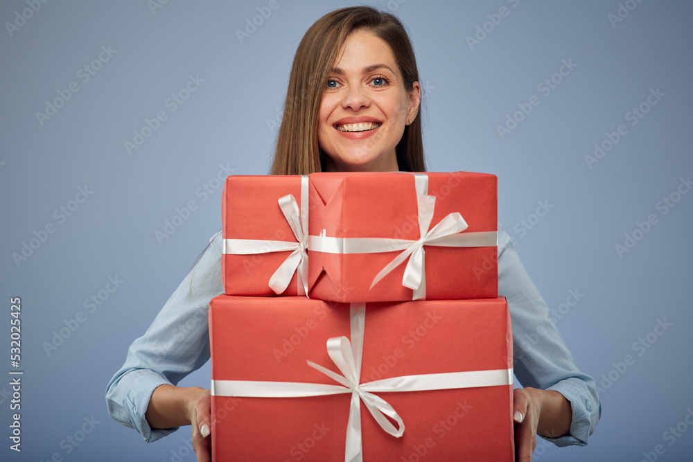 Happy woman and big stack of presents. Isolated female portrait. Happy woman and big stack of presents. Isolated female portrait.