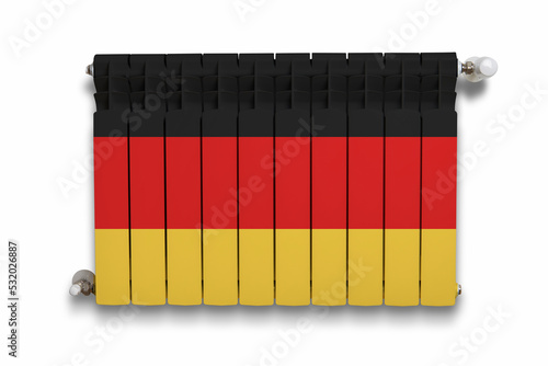 Heater with a regulator with a pattern of the flag of Germany against a white wall