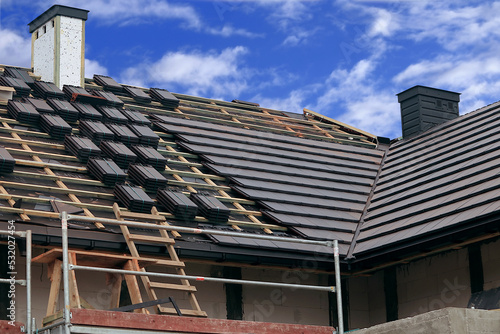 Building a house. laying the roof