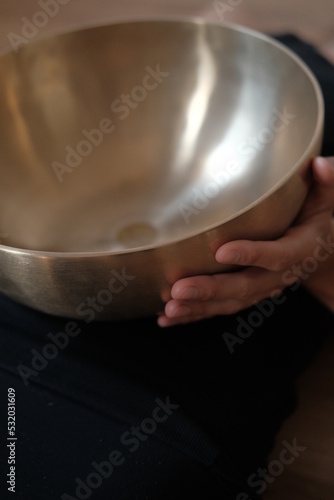 Singing copper bowl. Yoga, relaxation and meditation. Sound therapy, alternative medicine