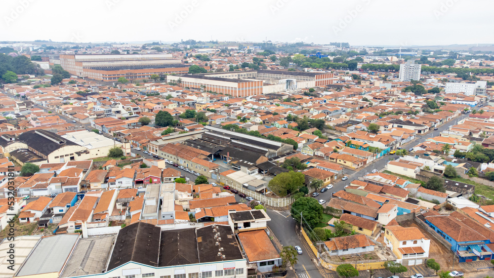 City aerial photo made with drone of a part of a small town in Brazil, selective focus, natural light.