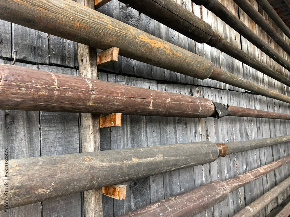 Wooden sticks on the wall. Ship wall, details from the match Wooden sticks on the wall. Ship wall, details from the match