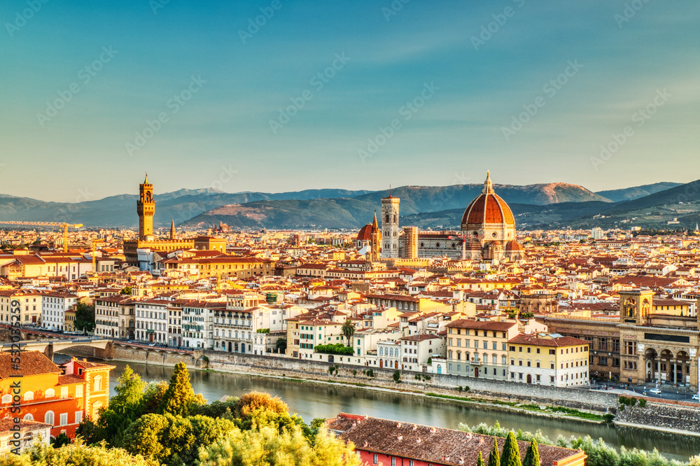 Florence Aerial View at Sunrise over Ponte Vecchio, Italy over Palazzo Vecchio and Cathedral of Santa Maria del Fiore with Duomo