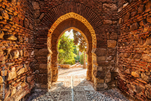 Gate of the Wall and the Gardens of the Alcazaba in the City of Malaga, Andalusia photo