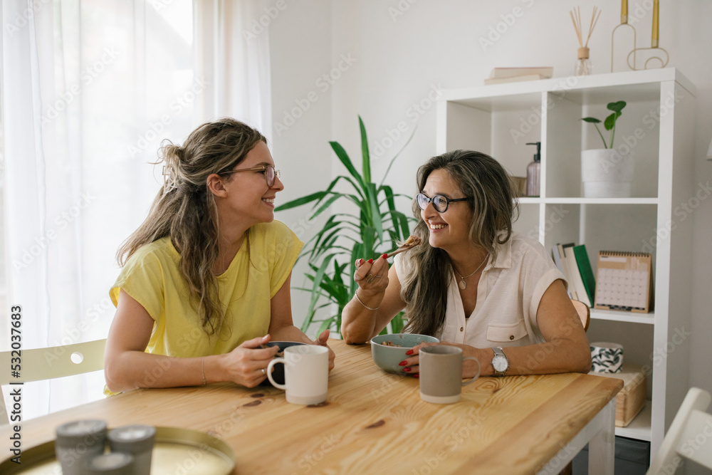 Caucasian family having a coffee and meal together Caucasian family having a coffee and meal together
