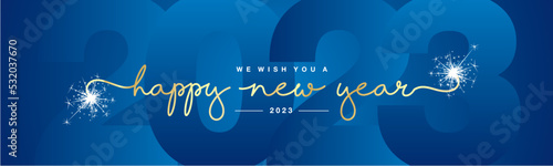 Happy New Year 2023 gold handwritten typography light glitter fireworks and blue 2023 background wallpaper banner