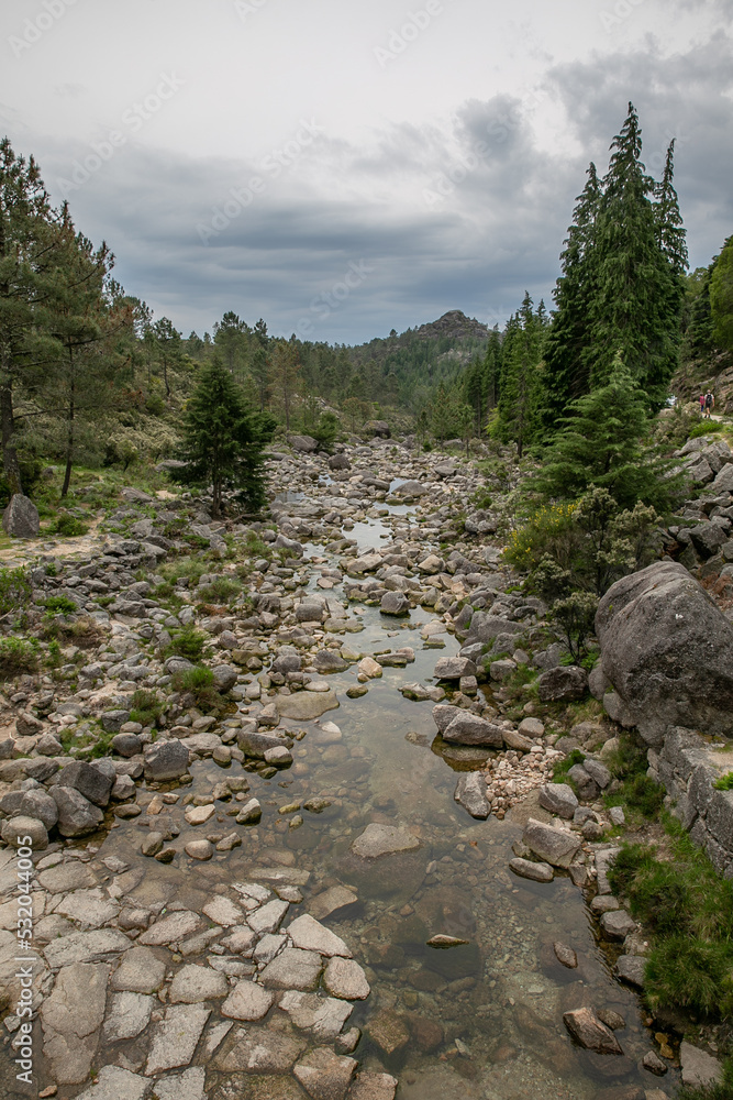 Fototapeta premium Peneda-Gerês National Park is located in northern Portugal. Its rugged hills are home to deer, wolves and golden eagles. The trails include a Roman road lined with landmarks.