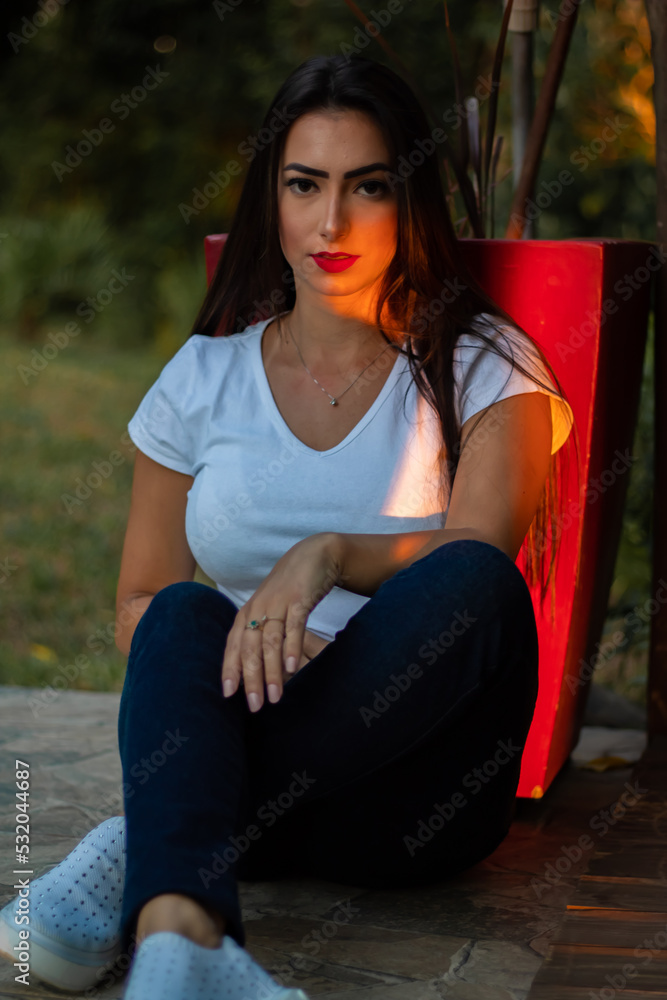 portrait of a beautiful brunette girl in the park portrait of a beautiful brunette girl in the park