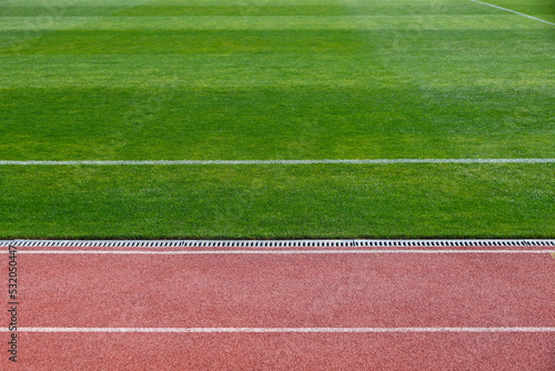 Details of football soccer stadium. Rubberized running track for athletics