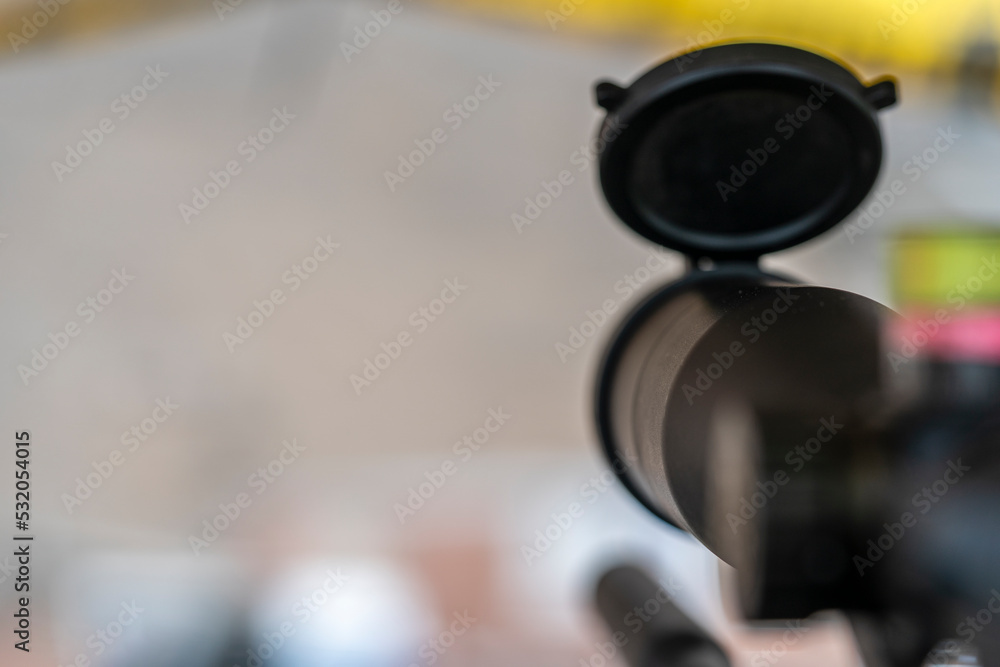 The shooter's view of a sniper rifle with a telescopic sight installed The shooter's view of a sniper rifle with a telescopic sight installed
