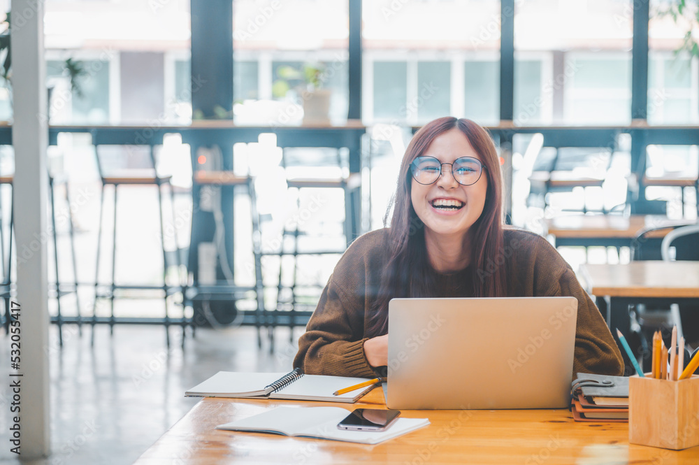 young student wearing headphones studies online, distance learning, and keeps up to date on the global coronavirus pandemic.. young student wearing headphones studies online, distance learning, and keeps up to date on the global coronavirus pandemic..