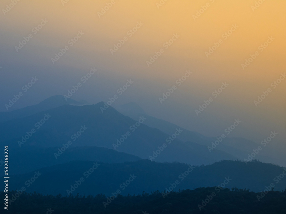Sunset over the mountains in western ghats 