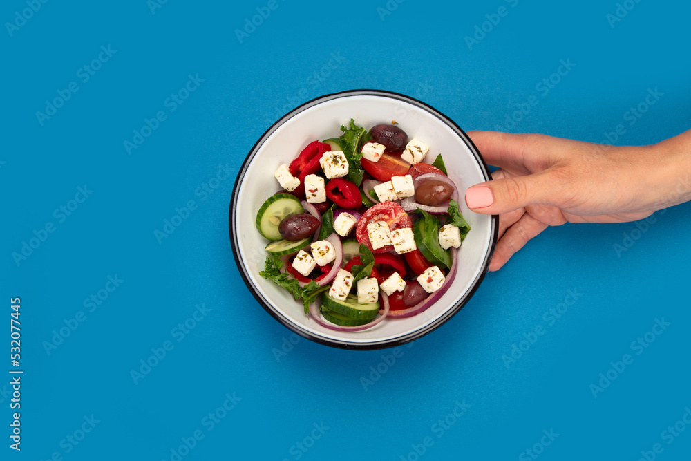 Greek salad on color background. Greek salad on color background.