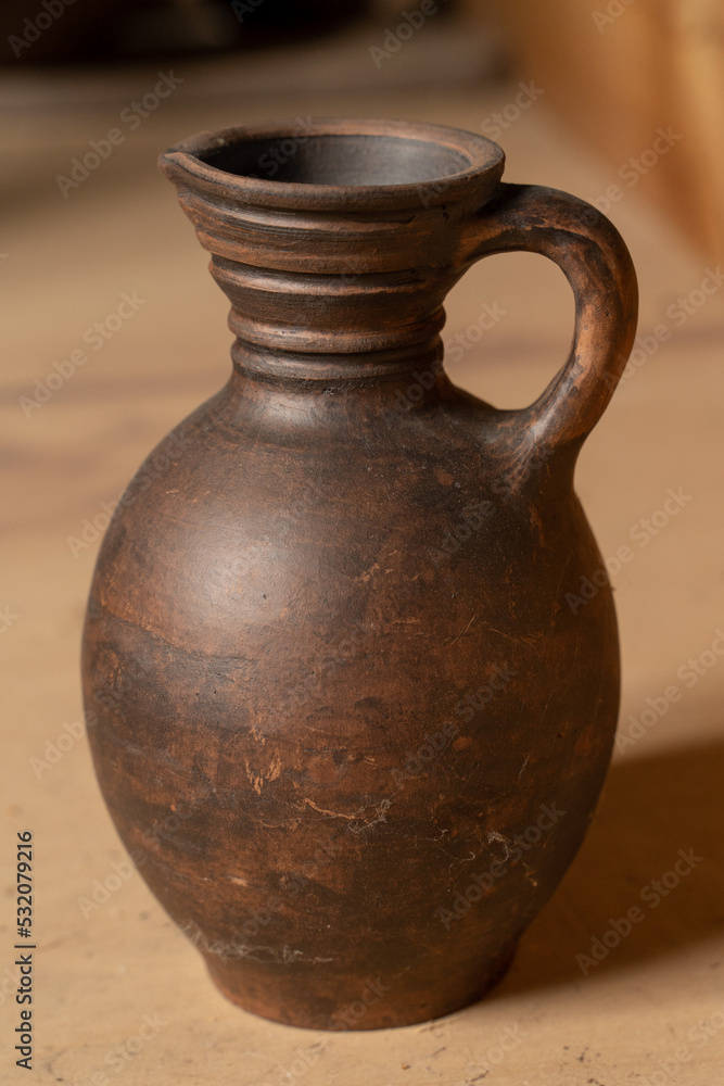 Pottery Craft. a ceramic product with your own hands, made on a Potter's wheel isolated on a white background.