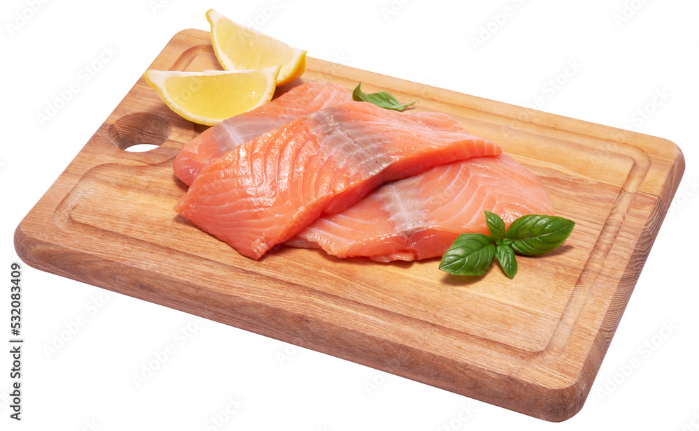 piece of salmon fillet on wooden cutting board piece of salmon fillet on wooden cutting board