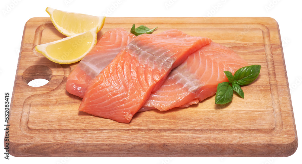 piece of salmon fillet on wooden cutting board piece of salmon fillet on wooden cutting board