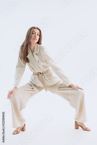 model in fashionable pantsuit