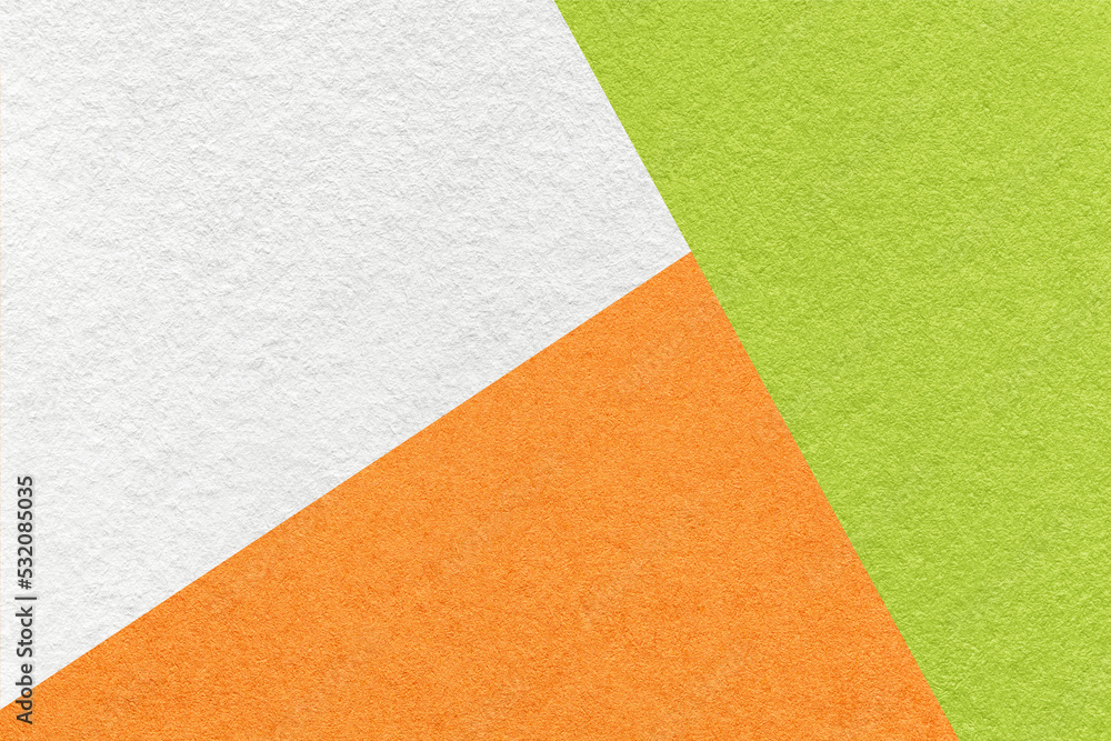 Texture of craft white, green and orange shade color paper background, macro. Structure of vintage abstract cardboard Texture of craft white, green and orange shade color paper background, macro. Structure of vintage abstract cardboard