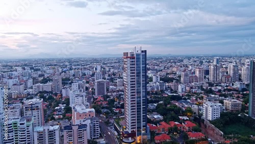 Evening South Point Tower in front of Mirador Sur Park. National District., Santo Domingo, Dominican Republic - aerial view photo