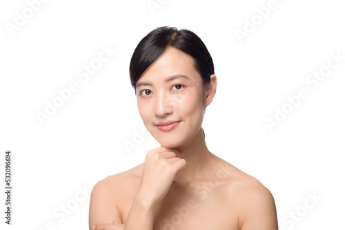 Portrait healthy pretty young woman isolated on white background. beautiful female model person applying cosmetic cream for skincare on fresh makeup clean face. spa, treatment, wellness concept.