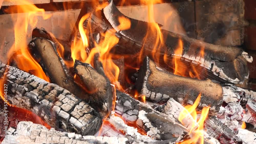Slow motion of natural wood charcoal grill with fire Slow motion of natural wood charcoal grill with fire