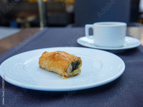 Handmade Spinach Cheese Pie - pastry, Turkish name el acmasi borek, rulo borek. Turkish borek rolls with spinach and cheese. A traditional Turkish pastry rulo borek photo