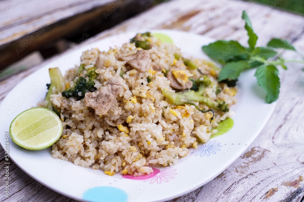 Fried rice is an easy and delicious dish.  consisting of eggs  Pork and broccoli and still affordable during bad economic times.