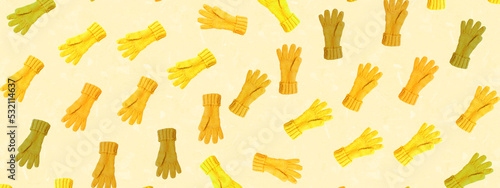 Panoramic background with a motif of yellow autumn gloves.