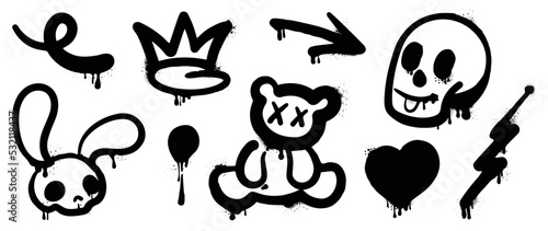 Set of black graffiti spray pattern. Collection of symbols, heart, crown, arrows, rabbit, bear, skull with spray texture. Elements on white background for banner, decoration, street art and ads.