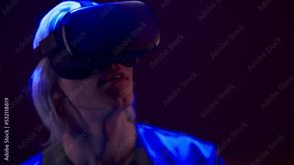 Spellbound man using augmented reality glasses closeup. Entertainment concept Spellbound man using augmented reality glasses closeup. Entertainment concept