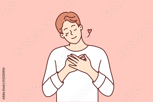 Happy young man hold hands on chest feeling grateful and thankful. Smiling guy show appreciation and gratitude. Vector illustration. 